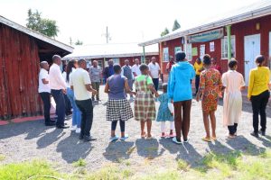 Kenya-AIST staff engage with the St. Rose Rescue Centre community during a session on mental health awareness