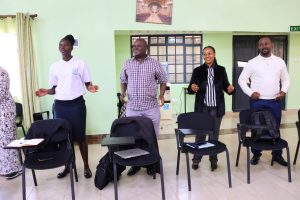 Staff warm up ahead of a day filled with exciting and interactive training sessions